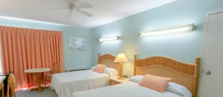 Standard Queen room with lights on